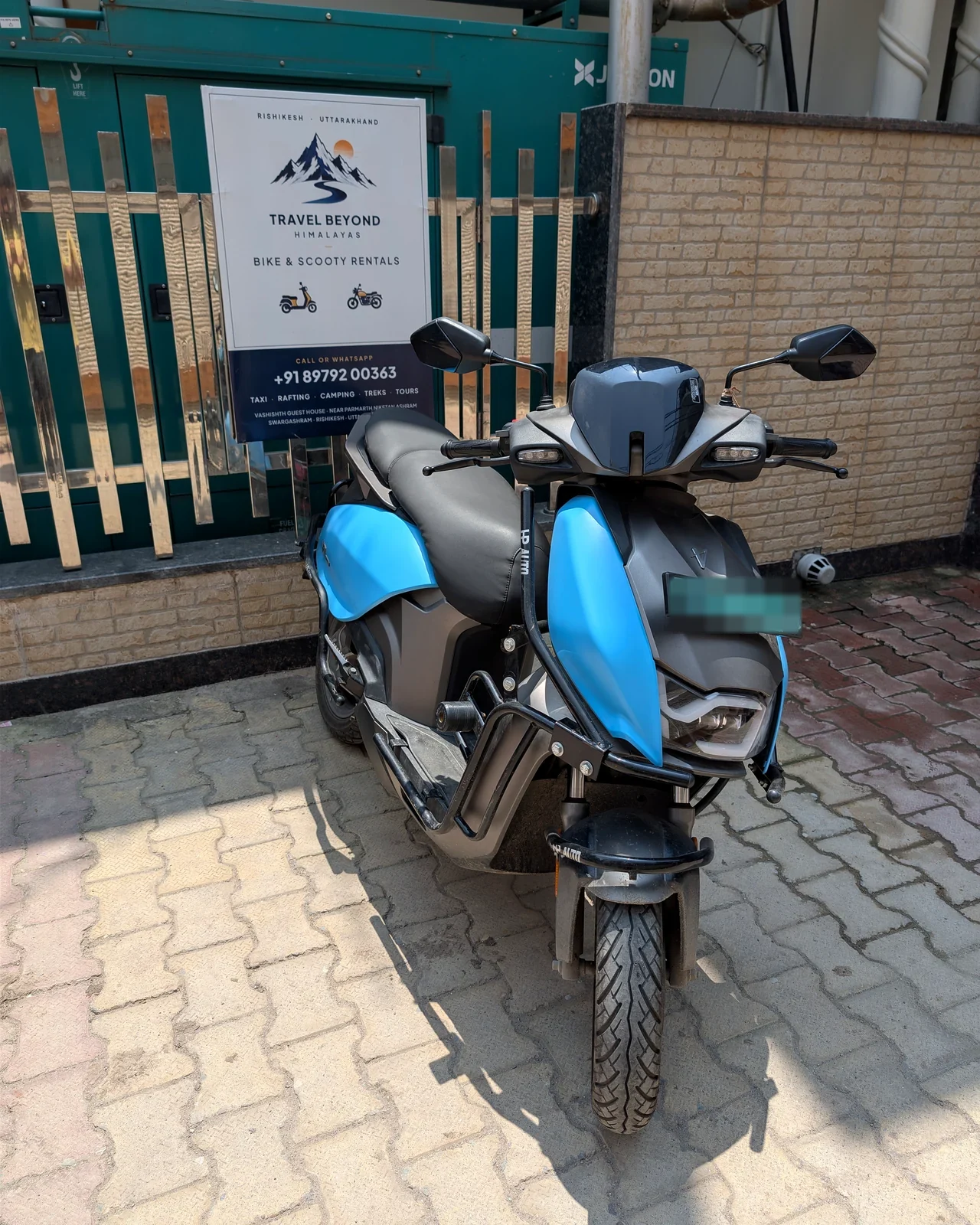 Three-quarter view of a Travel Beyond Himalayas electric rental scooter