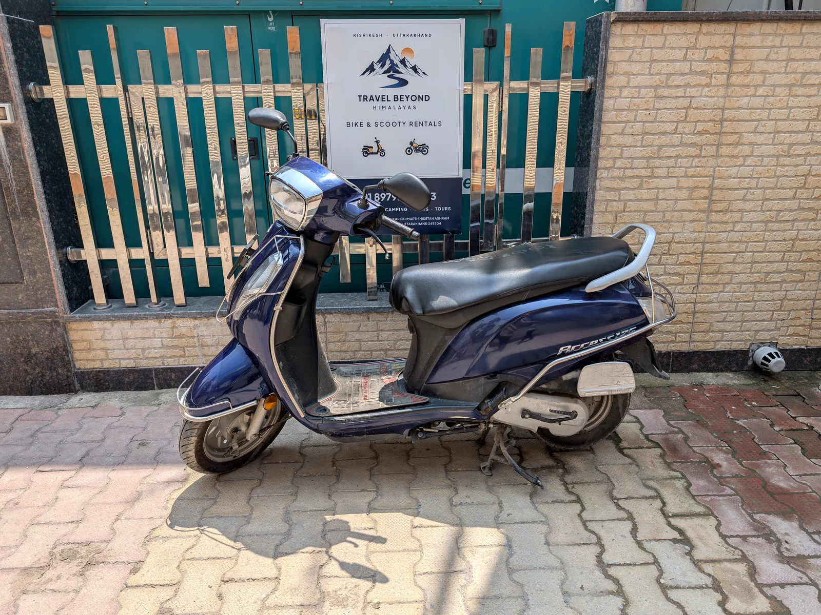Navy blue petrol scooter available for rent from Travel Beyond Himalayas in Rishikesh