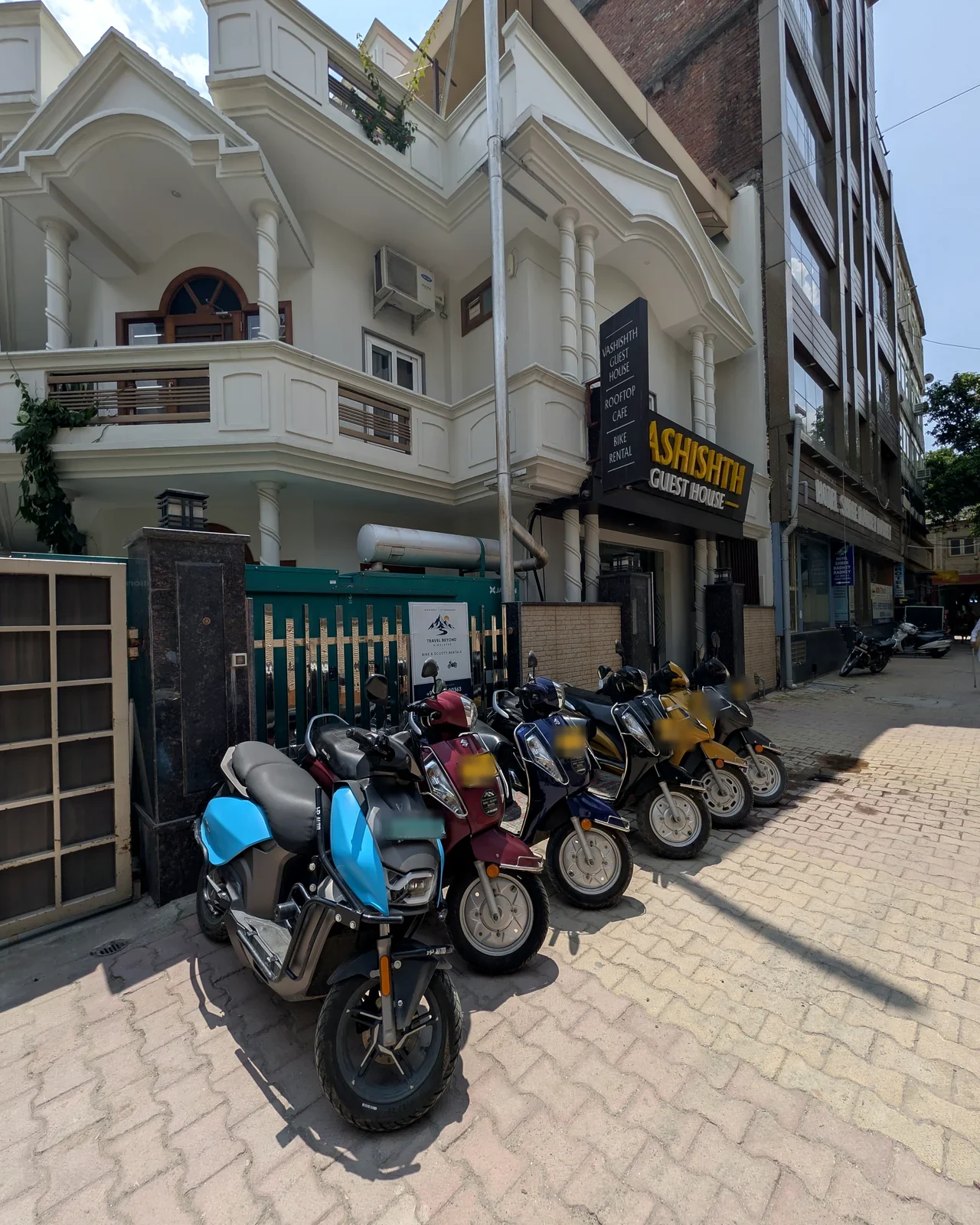Travel Beyond Himalayas scooter fleet ready for customer pickup at the Rishikesh office