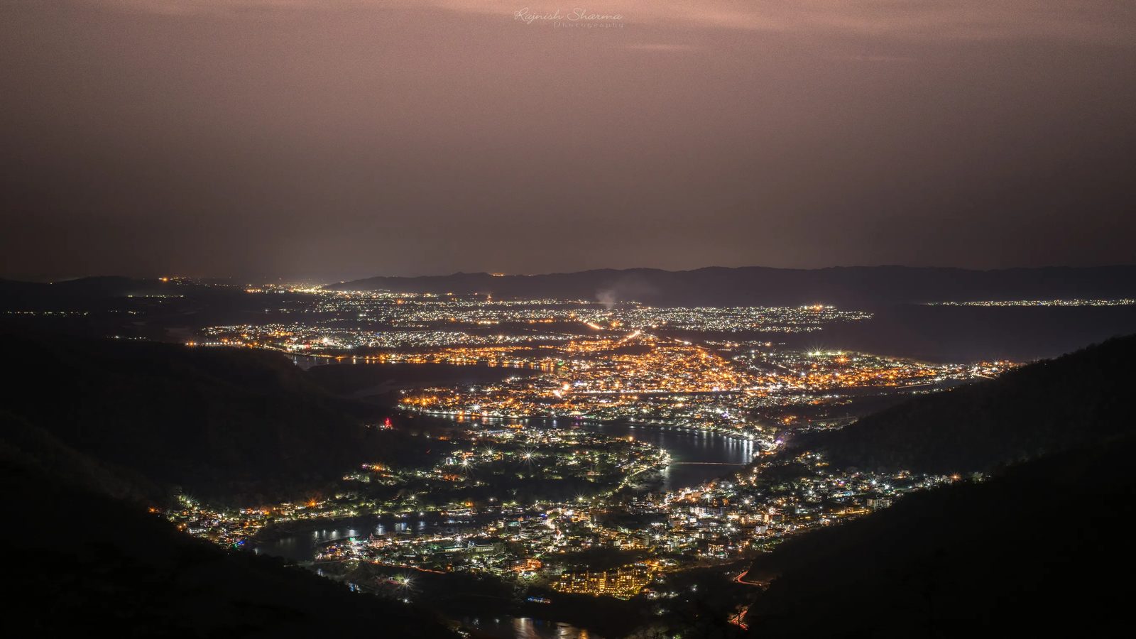 Rishikesh city lights at night aerial view